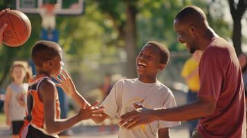 ein Gruppe von Männer spielen ein freundlich Spiel von Basketball mit Kinder im ein lokal Park wie Teil von ein Mentoring und Sport Programm foto