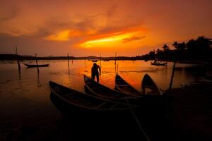 traditionell Boote beim Ö Darlehen Lagune im Sonnenuntergang, phu Yen Provinz, Vietnam foto