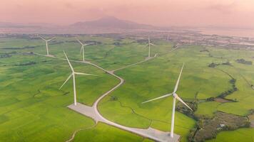 Aussicht von Turbine Grün Energie Elektrizität, Windmühle zum elektrisch Leistung Produktion, Wind Turbinen Erstellen Elektrizität auf Reis Feld beim Phan klingelte, neunh Thuan Provinz, Vietnam foto