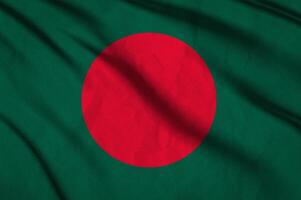 schließen oben winken Flagge von Bangladesch. foto