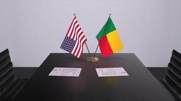 Benin und USA beim verhandeln Tisch. Geschäft und Politik 3d Illustration. National Flaggen, Diplomatie austeilen. International Zustimmung foto