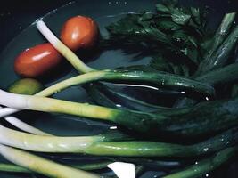 Lauch und Tomaten sind Sein gereinigt foto