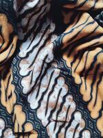 das Muster auf traditionell Batik, präsentieren visuell und philosophisch das Muster auf traditionell Batik, präsentieren visuell und philosophisch foto