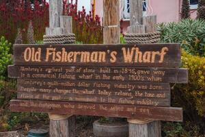 historisch hölzern Zeichen alt Fischers Kai, Monterey, Kalifornien foto