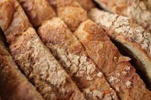 geschnitten Brot schließen hoch. Backen Hintergrund foto