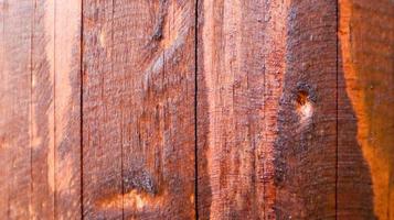 brauner Vintage-Holzhintergrund aus Brettern. dunkelbraune gealterte Holzstruktur mit natürlichem Streifenmuster für den Hintergrund, Holzoberfläche zum Hinzufügen von Designdekorationstext oder Kunstwerken. foto