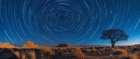 Sterne nachlaufend im das Nacht Himmel Über ein Leise Wüste foto