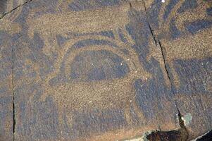 Petroglyphen innerhalb das archäologisch Landschaft von tamgaly. Almatie Bereich, Kasachstan foto