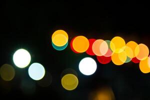 Farbe Bokeh gegen ein dunkel foto