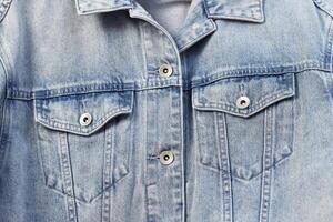 modisch Denim Jeans Jacke zum Jugendliche Textur Hintergrund foto