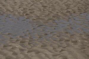 niedrig Tide beim das Strand foto