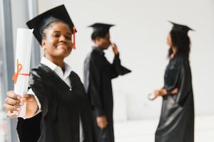 Gruppe von afrikanisch amerikanisch Absolvent Studenten foto