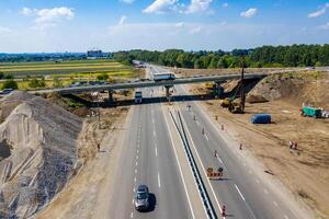 Konstruktion Arbeit mit Maschinen. Autobahn Straße reparieren Konzept. foto