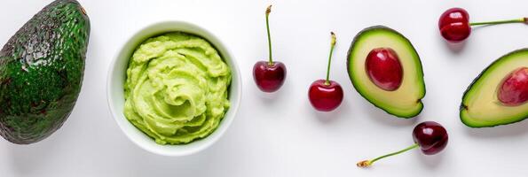 frisch Avocados und glatt Guacamole mit Kirschen auf ein Weiß Hintergrund foto