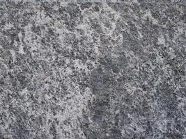 grauer Steinbeschaffenheitshintergrund foto