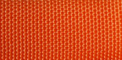 industriell Stil Orange Stoff Textur Hintergrund foto