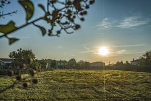 Landschaft Dorf Sonnenuntergang Szene foto