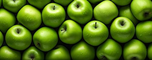 Hintergrund gefüllt mit saftig und frisch Grün Äpfel foto