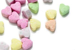 Rosa und lila Herz geformt Süßigkeiten. Valentinstag Tag Hintergrund. 4 foto