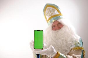 Magie anders interessant Hand Bewegungen Hexerei Fee Geschichte 12 Monate Heilige Nikolaus Grün Bildschirm Chroma Schlüssel Telefon Gründer von Santa Einfrieren Moroz Iwanowitsch Winter Monat Januar Februar Dezember foto