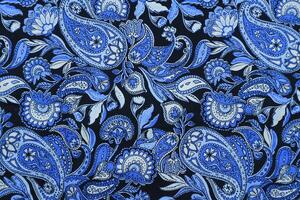 Blau Paisley Muster Stoff Hintergrund foto