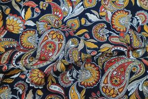 Gelb Paisley Satin- Stoff Hintergrund foto