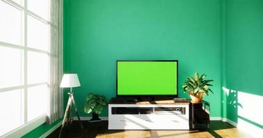 Smart-TV mit leerem schwarzem Bildschirm, der am Schrankdesign hängt, modernes Wohnzimmer mit Minzwand auf weißem Holzboden. 3D-Rendering foto