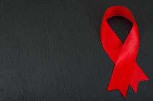 Welt-Aids-Tag, rotes Band, Symbol. foto