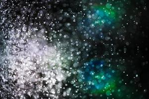 abstrakter Hintergrund aus Spritzwasser, ähnlich einem Stern oder einer Galaxie, die als Tapete verwendet wird foto