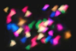 Regenbogenfarben-Overlay-Lichtstrahlen blinken und leuchten Textur elegantes Schwarz foto