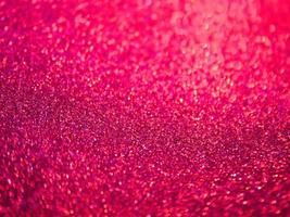 roter Glitter abstrakte raue Zementbodenbeschaffenheit für Unschärfehintergrundweihnachten foto