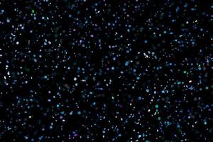 dunkelblauer funkeln abstrakter stilvoller Lichteffekt auf schwarzem Hintergrund und funkelt funkelnde magische Staubpartikel auf Schwarz foto
