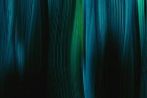 blauer und grüner glatter abstrakter Hintergrund und Bewegung verschwommener heller Hintergrund und diagonale Linien des Farbverlaufs foto