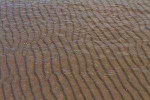 Sandtextur unter Wasser foto