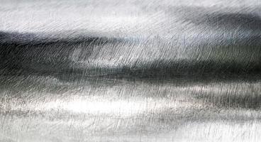Textur der glänzenden Kratzfläche Edelstahl Rundstab foto