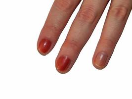 weibliche Finger mit der Maniküre foto