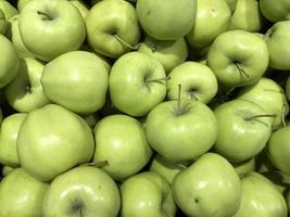 Makrofoto grüne Äpfel. stock photo grüner Apfel Obst Hintergrund foto