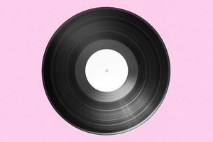 Vinyl-Schallplatte mit Banketikett isoliert auf rosa Hintergrund. Attrappe, Lehrmodell, Simulation foto