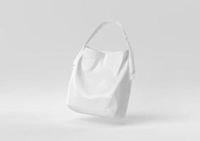 weiße Tasche Damenmode-Accessoires schwebend in weißem Hintergrund. minimale konzeptidee kreativ. Origami-Stil. 3D-Rendering. foto