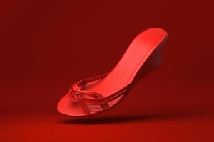 roter Schuh, der in roten Hintergrund schwimmt. minimale konzeptidee kreativ. 3D-Rendering. foto