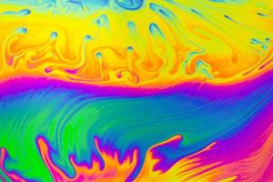 psychedelischer Hintergrund mit mehrfarbigen Mustern. Fotomakroaufnahme von Seifenblasen foto