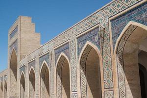 das alte Gebäude, die Mauer mit Bögen. alte gebäude des mittelalterlichen asiens. Buchara, Usbekistan foto