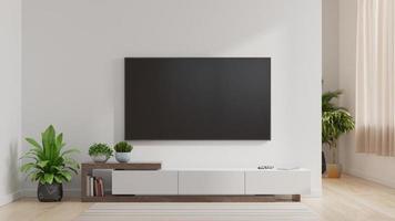 LED-TV an der weißen Wand im Wohnzimmer, minimalistisches Design. foto