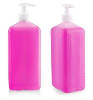 der flüssigkeitsbehälter für gel, lotion, creme, shampoo, bad aus rosa kosmetikplastikflasche mit weißer spenderpumpe. foto