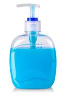 Plastikflasche der blauen transparenten Flüssigseife isoliert auf weißem Hintergrund foto