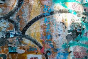 abstrakte bunte städtische Straßenkunst-Graffiti-Texturhintergrund. Nahaufnahme der urbanen Wandfarbe für moderne Kunst. foto