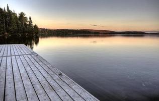 See im Herbst Sonnenaufgang Reflexion foto