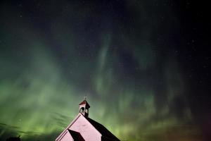 Landkirche und Nordlichter foto