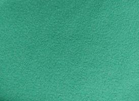 Fleece-Plaid-Textur. hintergrundbild trendfarbe 2021 grün. foto