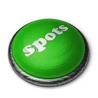 Fleckenwort auf grünem Knopf lokalisiert auf Weiß foto
